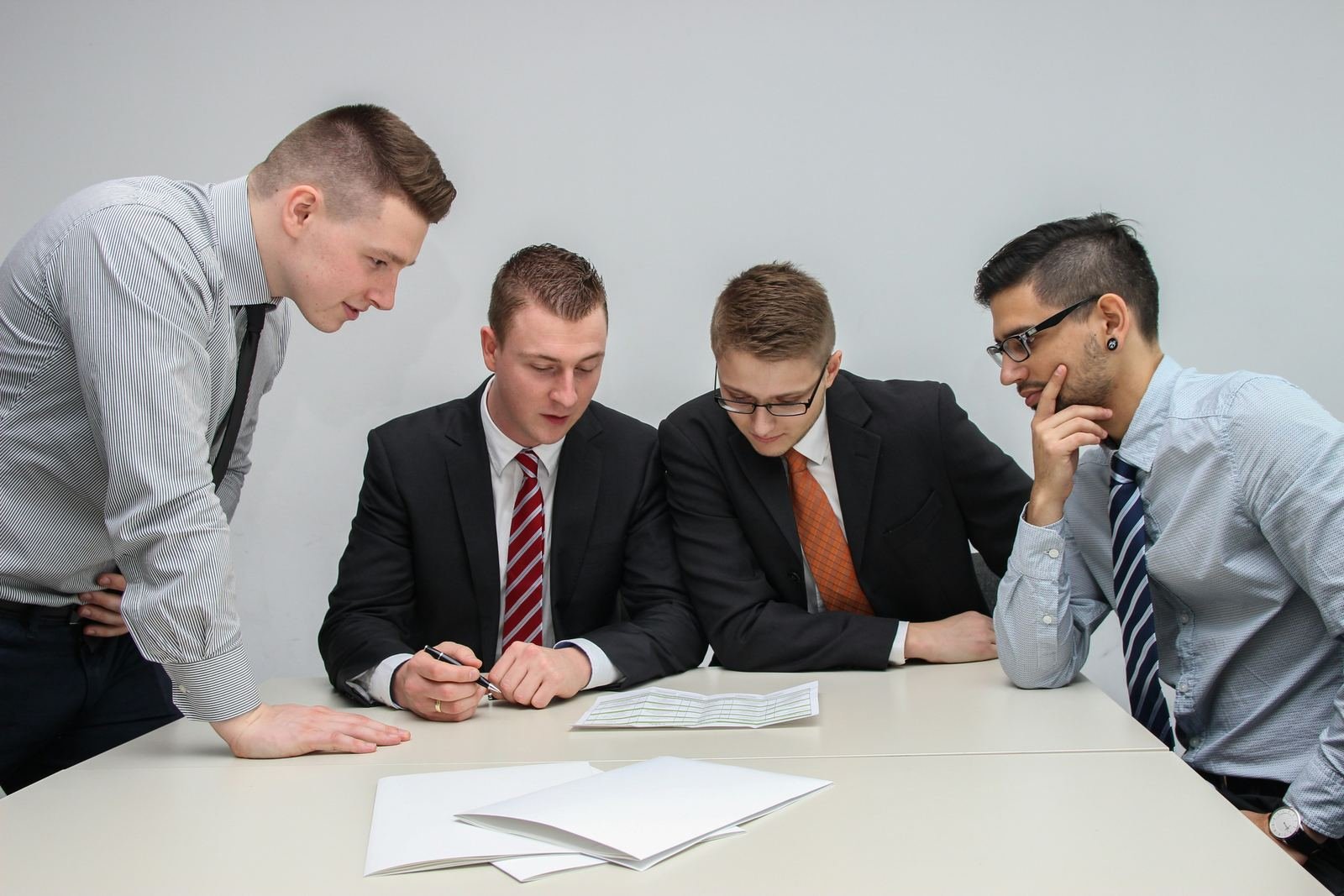 Professionals working together around a table